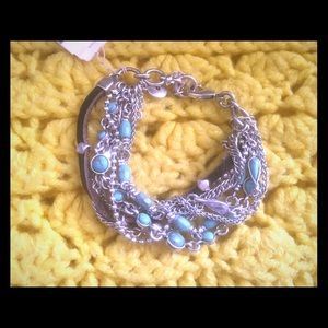 Bracelet turquoise, silver, leather 8 strands